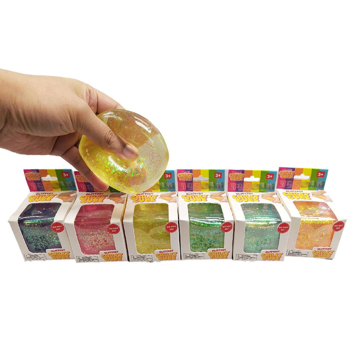 Glitter Chilly Cube being squeezed to show the glitter swirling inside
