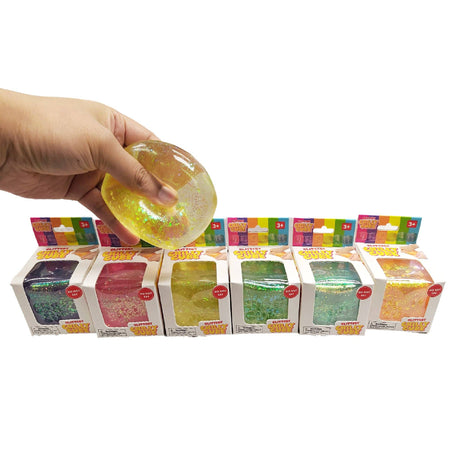 Glitter Chilly Cube being squeezed to show the glitter swirling inside